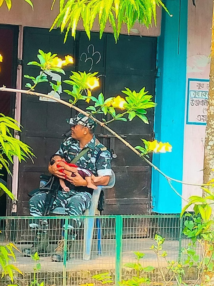 While the mother is casting her vote, the @BSF_India JAWAN is taking care of the baby. Pic Credit @District Administration, South Tripura