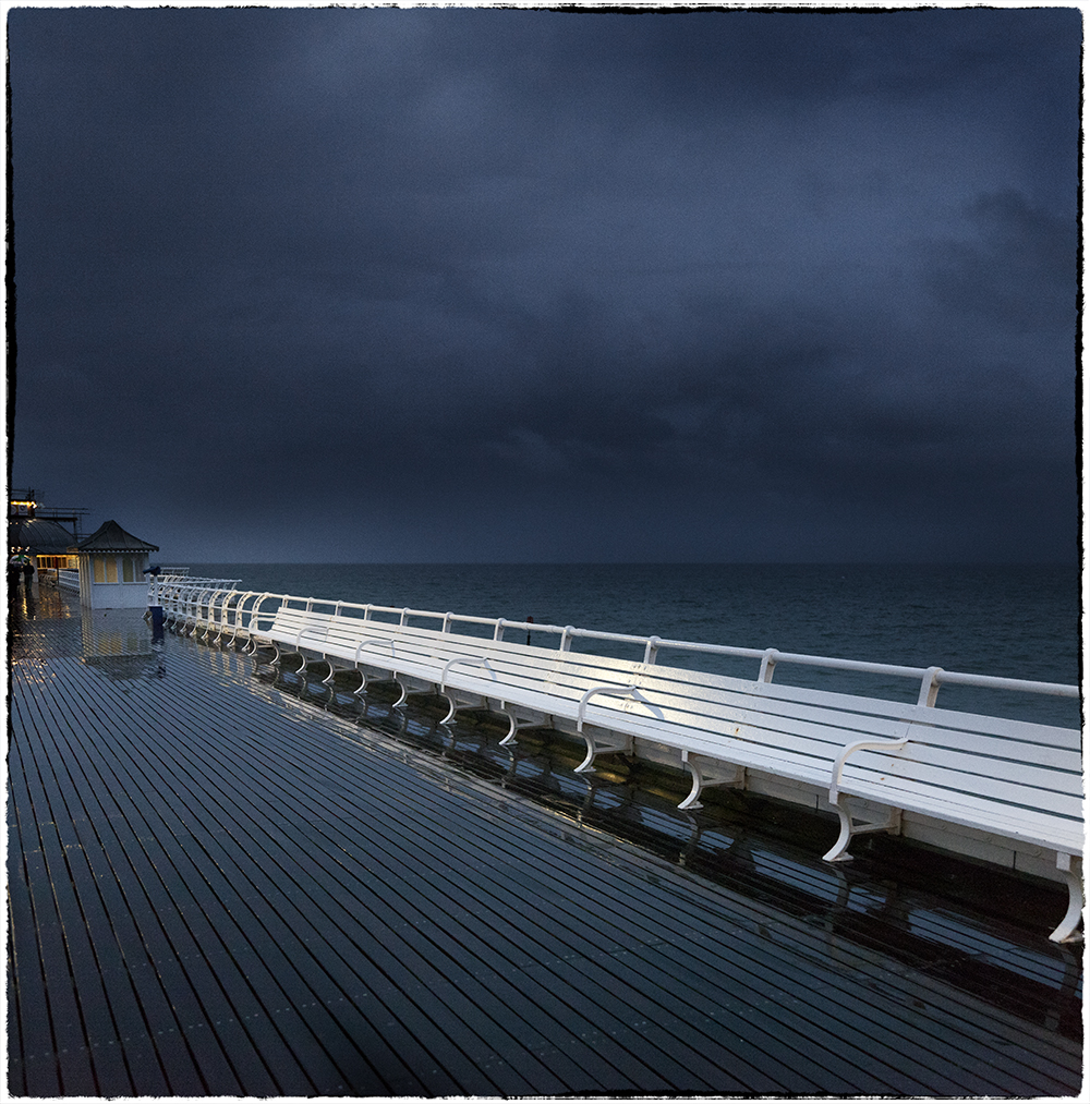 'Nocturne on the pier'

It shouldn't take you long to get to which pier?
#Norwich 
#Norfolk 
#norfolkart
#norfolkcoast
#piers 
#stormyweather