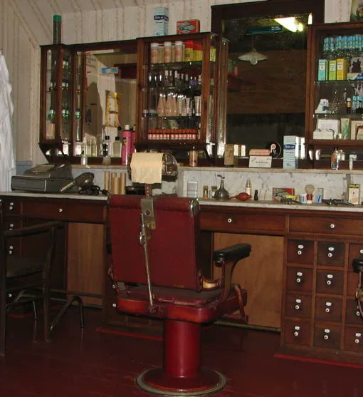 Anyone, old enough to have been asked, 'something for the weekend, sir? This image is almost identical to my first barber I went to as a working lad. Red Lion yard, Rotherham.