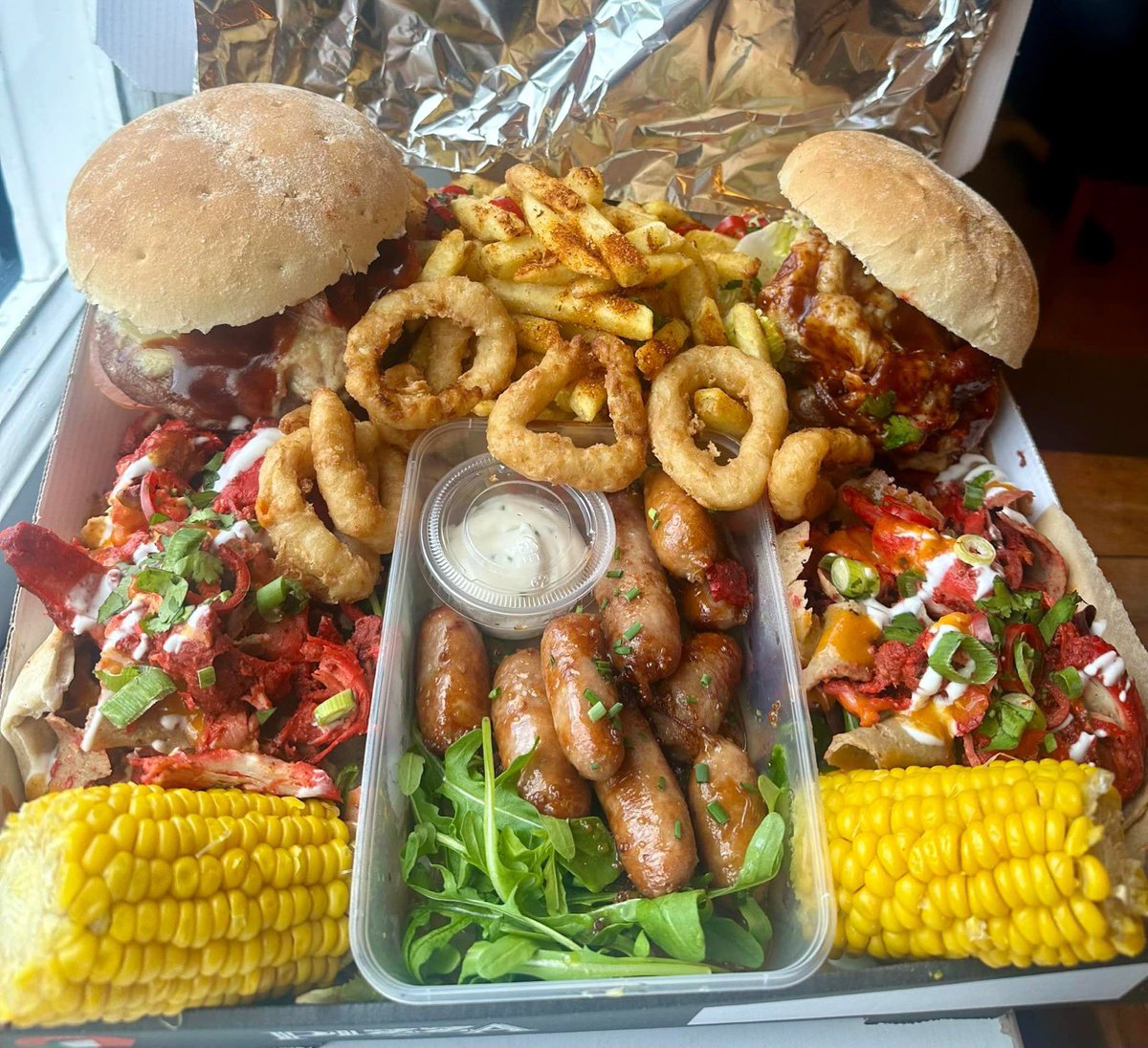 Friday special box 😍 Steak burger cheese bacon bbq sauce Chicken burger cheese bacon bbq sauce 2 x donner and chicken kebabs with Piri Piri & cool yougurt Corn on the cob Onion rings Cajun fries Sticky sausages,garlic mayo £25 combo deal £45 thefatboarwrecsam.co.uk/takeaway