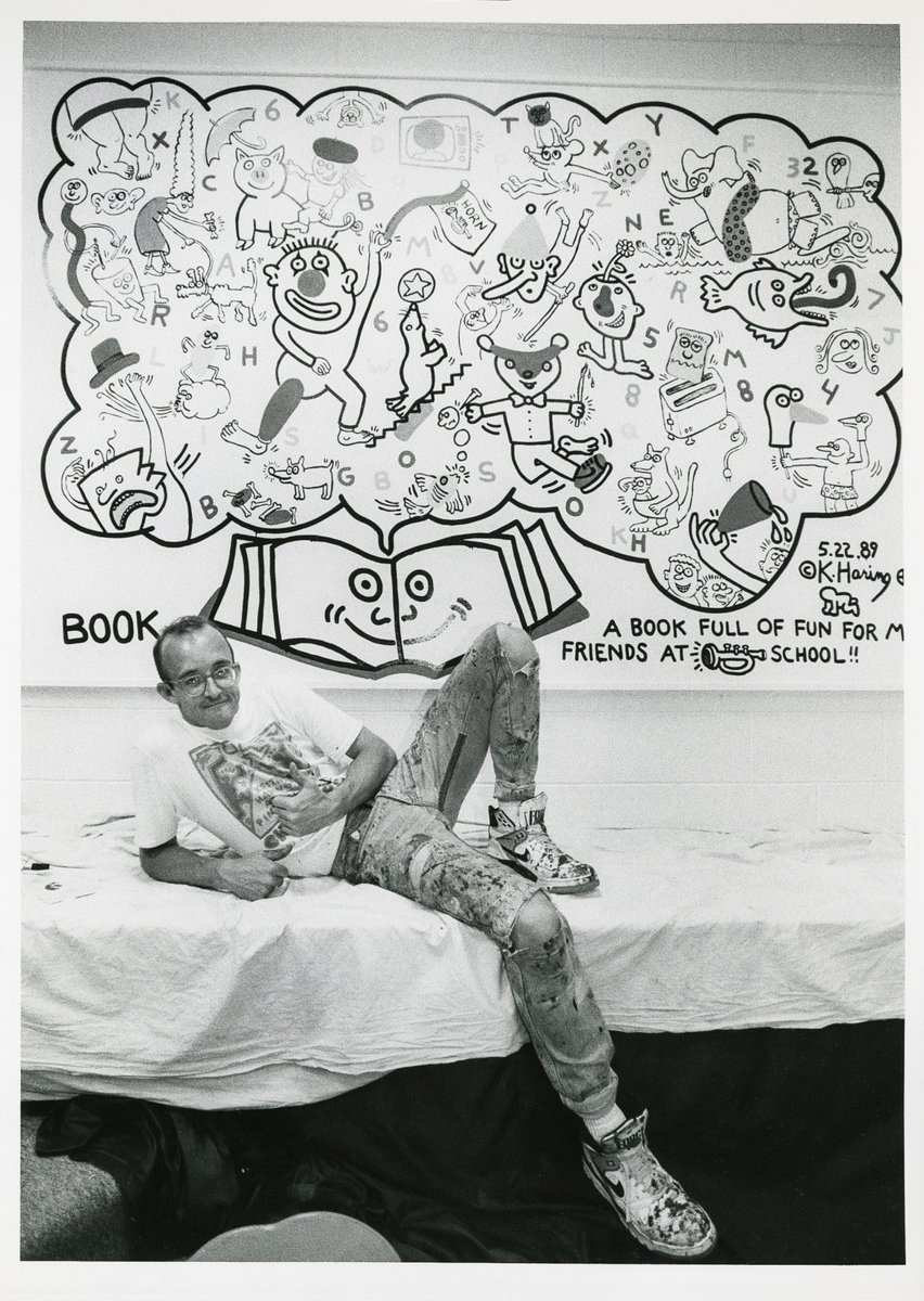 Keith Haring at work on his mural at Ernest Horn Elementary School, 1989 + #KeithHaring at work on the mural at Ernest Horn Elementary School on May 22, 1989 +  posing with “A Book Full of Fun” (1989) — via @hyperallergic 

—

#SOCIOPOLITICALFETISHES