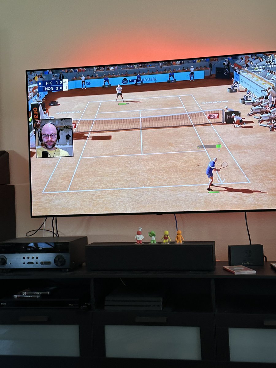 Visiting my girlfriend. So she put this guy on the tv handed me an iPad with battlegrounds downloaded, a juice box and said “I got to work for a bit. Ttyl” 

Now I am here watching this guy play fake tennis while I play battlegrounds