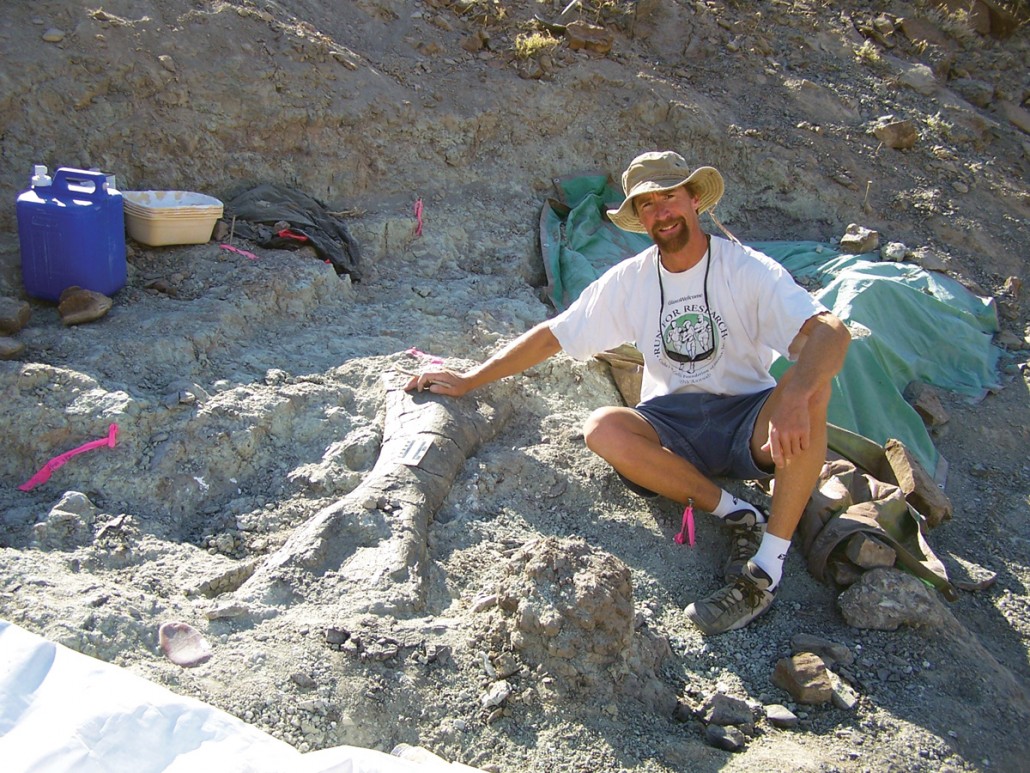 Although most of the fossil bones you see on display in museums might look strong, most of them were not found in that condition. Here, UGS preparator Don DeBlieux is next to a partially excavated dinosaur humerus (upper arm bone) in the field. #FossilFriday