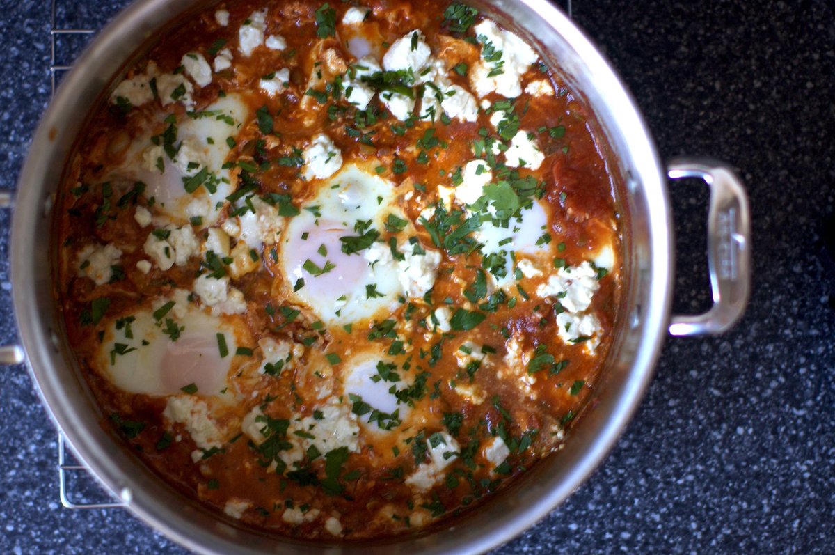 I bet it's been way too long since you last had eggs poached in a spicy tomato sauce, showered with feta and parsley, and there's no time like lazy Friday to fix it. smittenkitchen.com/2010/04/shaksh…
