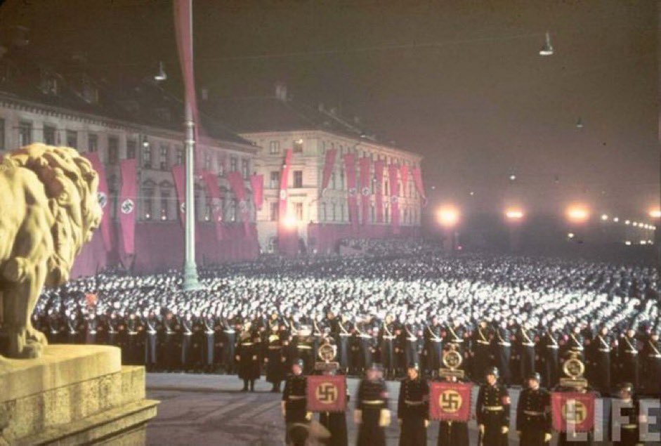 @Morbidful Annual midnight swearing-in of Nazi SS troops, Feldherrnhalle, Munich, Germany, 1938.

The German Schutzstaffel, or SS, was different from the German Wehrmacht (regular army). SS officers and soldiers swore an oath of loyalty to Hitler, which went as follows: 

“I vow to you,…