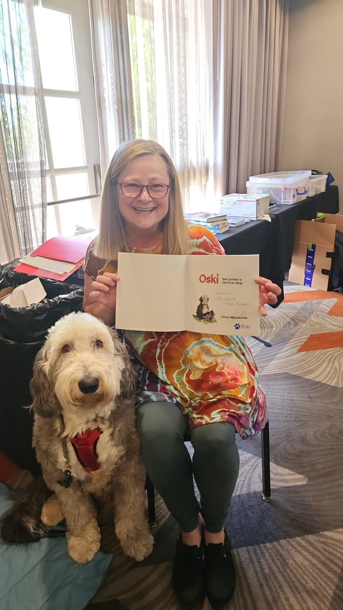 Stopped by the bookstore and picked up a copy of the long-awaited "Oski becomes a service dog" book by Chris Mandeville and got it signed for Emberly! 💜  #ppwc2024 <a href="/PikesPeakWrite/">Pikes Peak Writers</a> #writecolorado #coloradoauthors #WritingConference #teamoski (teamoksi.com) #pawtograph