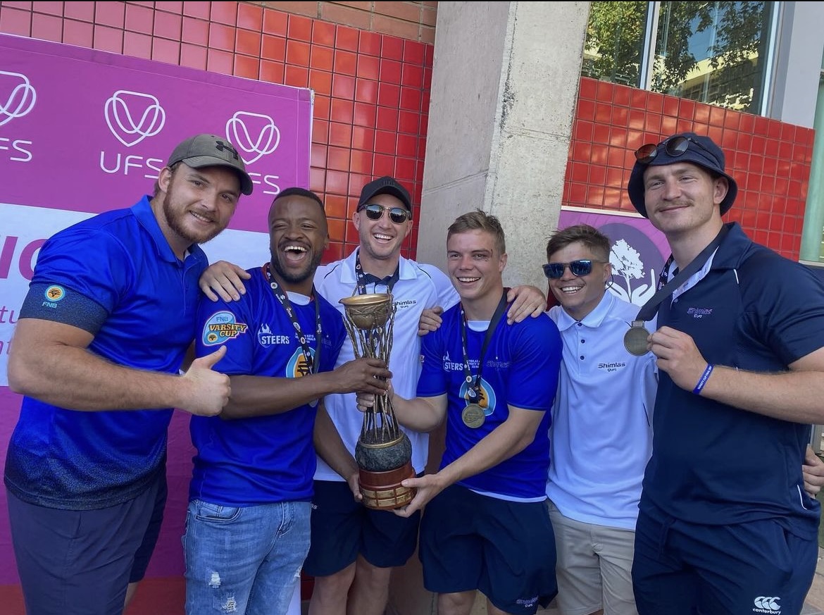 SHIMLAS THANK UFS COMMUNITY

Yesterday the Shimlas embarked on a bus tour, showcasing the Varsity Cup trophy across the Bloemfontein and South campuses. 

To celebrate with and thank the UFS community. The Qwaqwa trophy parade’s date will be communicated soon.

#ProudlyKovsies