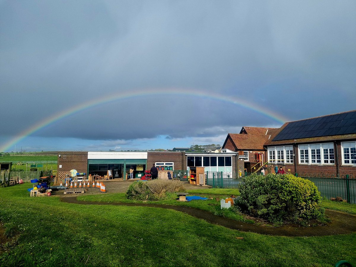 Beautiful picture sent by one of our parents of a rainbow arching over our little EYFS unit 🌈💜 #eyfs #earlyyears