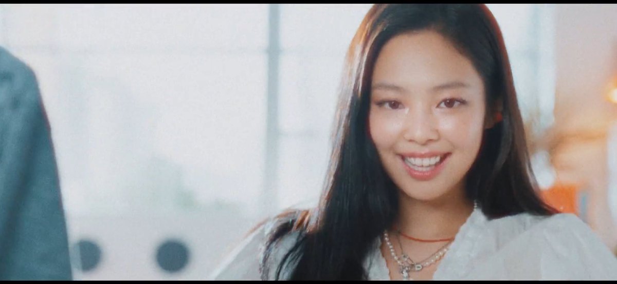 Jennie in the music video to SPOT!