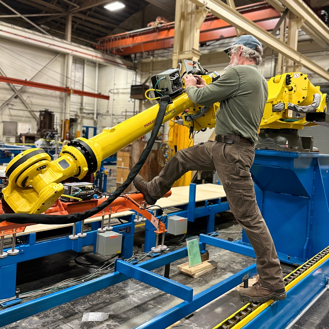 Check out Dale stretching the limits (literally!) to wire up our FANUC R-2000iC robot. Whether it's yoga or robotics, flexibility always comes in handy at Globe!- mtr.bio/globe-machine-… #fanucrobotics #electricalengineering #manufacturing #factoryautomation