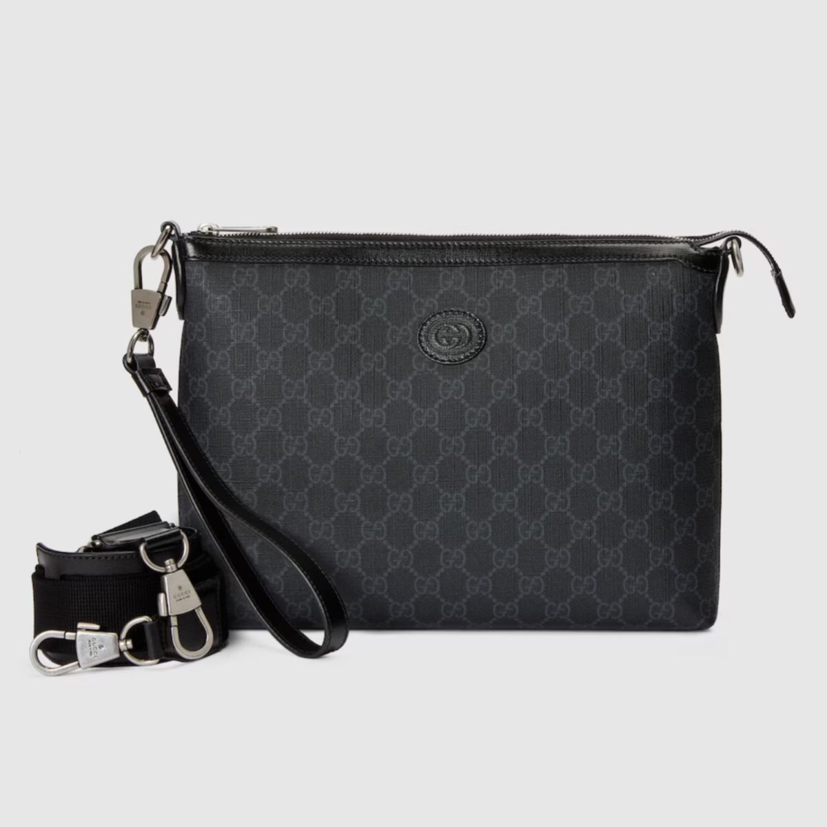 hyunehans's tweet image. leeknow was using the gucci messenger bag in supreme black at the airport!