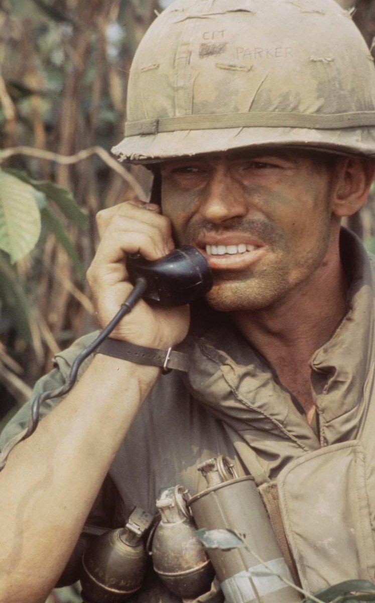 US Officer on the radio near Khe Sanh Vietnam - early 1968. The writing on his helmet identifies him as “CPT Parker” LIFE Magazine Archives - Larry Burrows Photographer WWP-PD #VietnamWar #MilitaryFriday