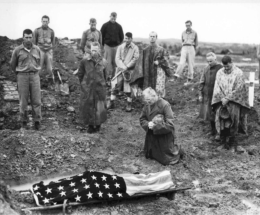 U.S. Marine Colonel Francis Fenton conducting the funeral of his son Private First Class Mike Fenton near Shuri, Okinawa, in May, 1945.

#History #WWII