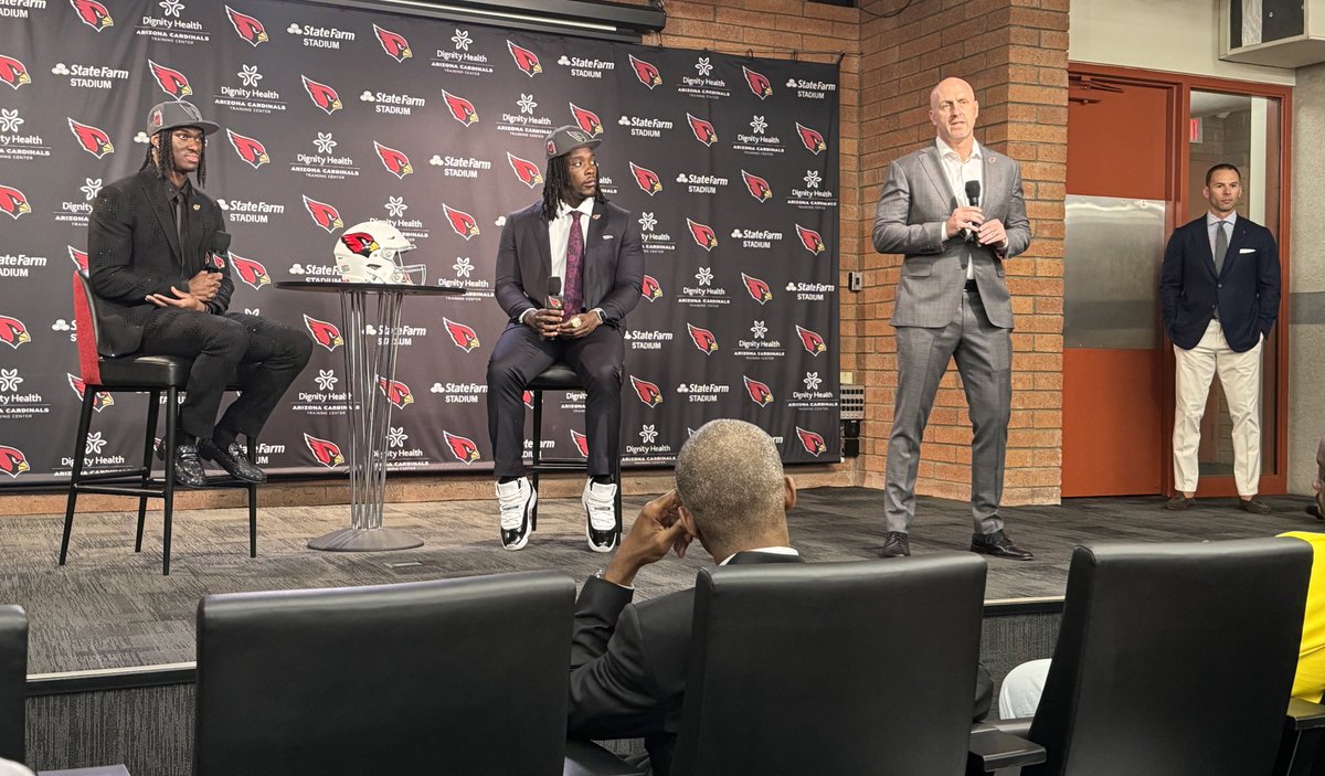 #AZCardinals GM Monti Ossenfort introduces their 1st round picks, #4 Marvin Harrison Jr & #27 Darius Robinson, as Jonathan Gannon looks on, as well as HOF Marvin Harrison Sr in the front row.
