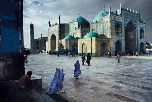 Salat at Blue Mosque in Mazar-E-Sharif, 1992 • Steve McCurry •
