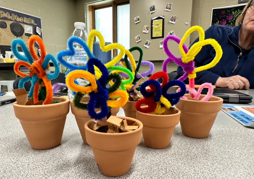 Morning PD with the best SCs around! Loved building our grief garden today. We each “potted” a plant with petals represent colors that remind us of our loved one. Can’t wait to use this in Grief Group at school! #schoolcounselor #griefrelief