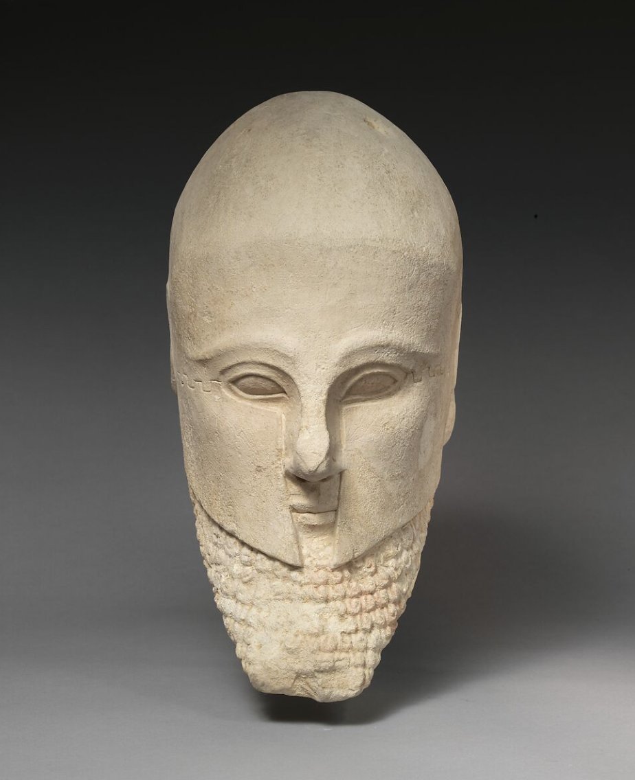 Limestone bearded head with a Corinthian helmet, Cypriot, early 5th century BC
