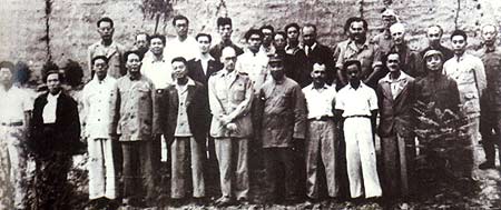 Mao Zedong, Zhu De, Zhou Enlai, Nie Rongzhen, Yang Shangkun, Xu Teli, Wu Yuzhang and others meeting with a delegation of Chinese and foreign correspondents visiting Yan'an.