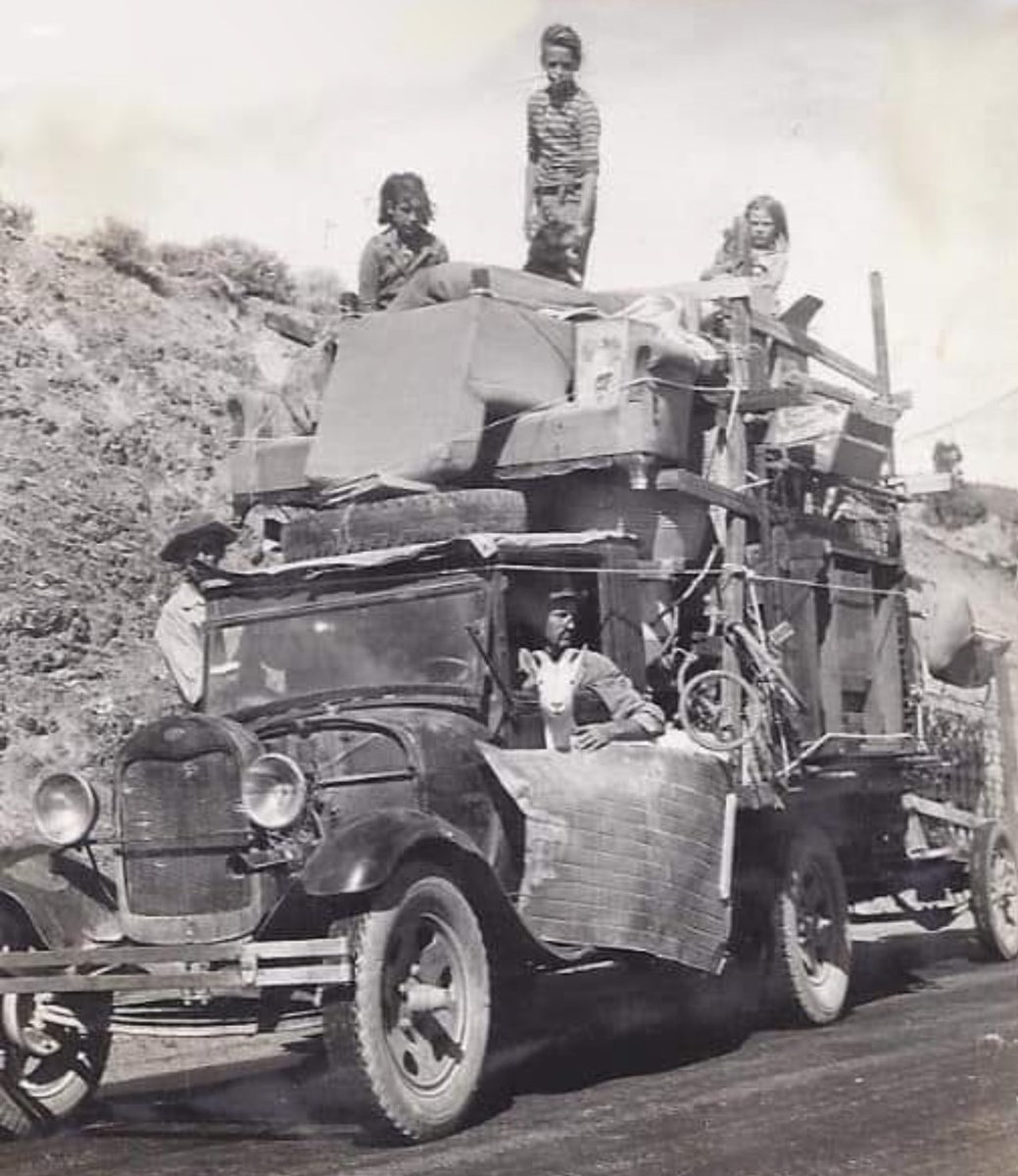 Dust Bowl Refugees heading west to start a new life,1934.