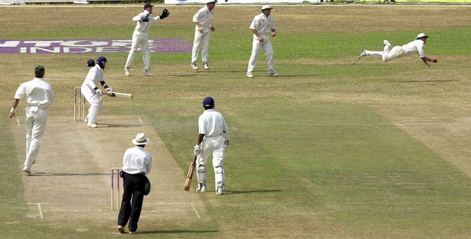 Graham Thorpe takes a diving catch to dismiss Sri Lanka's captain Sanath Jayasuriya first ball, 2nd Test, Asgiriya Stadium, Kandy, March 9th 2001. The only problem was it was a bump ball, one of a string of dreadful decisions in the series (Patrick Eagar)