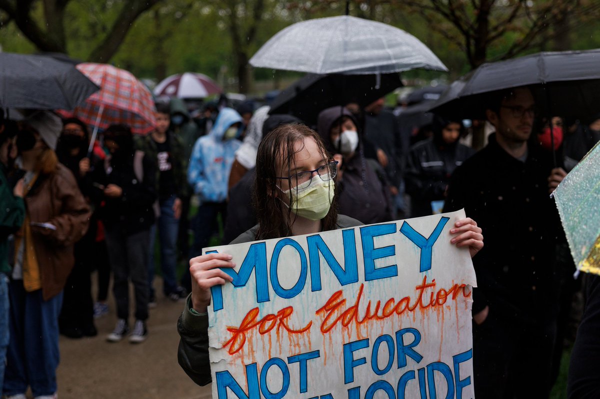 Students and activists attend a pro-Palestinian rally at the University of Chicago Friday in Chicago. Attendees spoke about the importance of divesting university funds from institutions with ties to Israel.