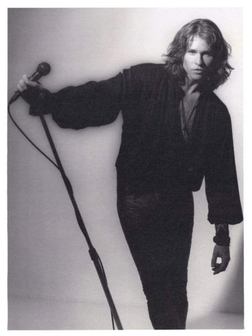 Val Kilmer as Jim Morrison, 1991