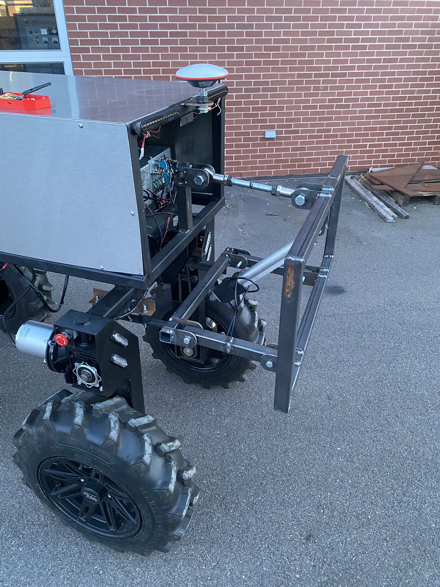 Added 3 point hitch system to our robot
