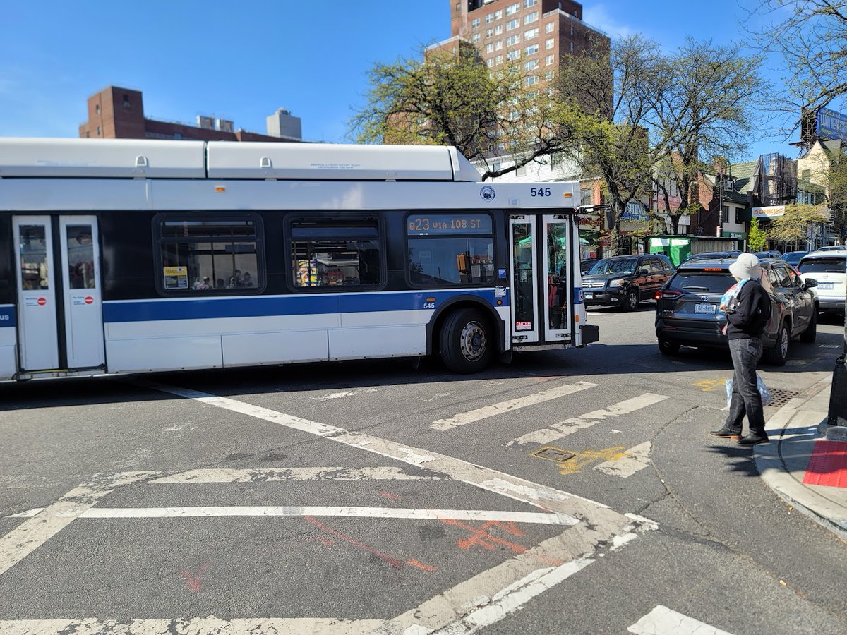 Why is the Q23 the "slowest bus in Queens?"

It should be obvious.

(Picture: #FixAustinStreet + 71st Ave, a single car is blocking the whole bus from turning, which is making the bus also block pedestrians during the pedestrian scramble phase)

<a href="/Lynn4NYC/">Lynn Schulman 舒曼琳</a> <a href="/NYC_DOT/">NYC DOT</a> <a href="/ASaferAustinSt/">Neighbors for a Safer Austin Street</a>