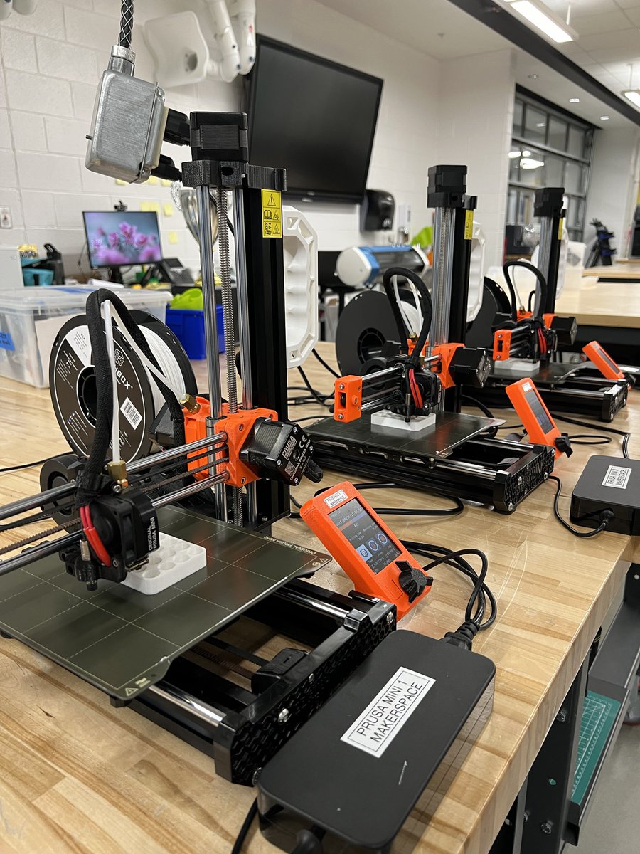 Some TLC for the #makerspace loaner @Prusa3D Mini+ #3Dprinters. New handles, labels & firmware updates. Printing eppendorf tube holders a teacher needs for a lab on Monday as test prints. Updated firmware makes them faster than when new! #MakerspaceLife