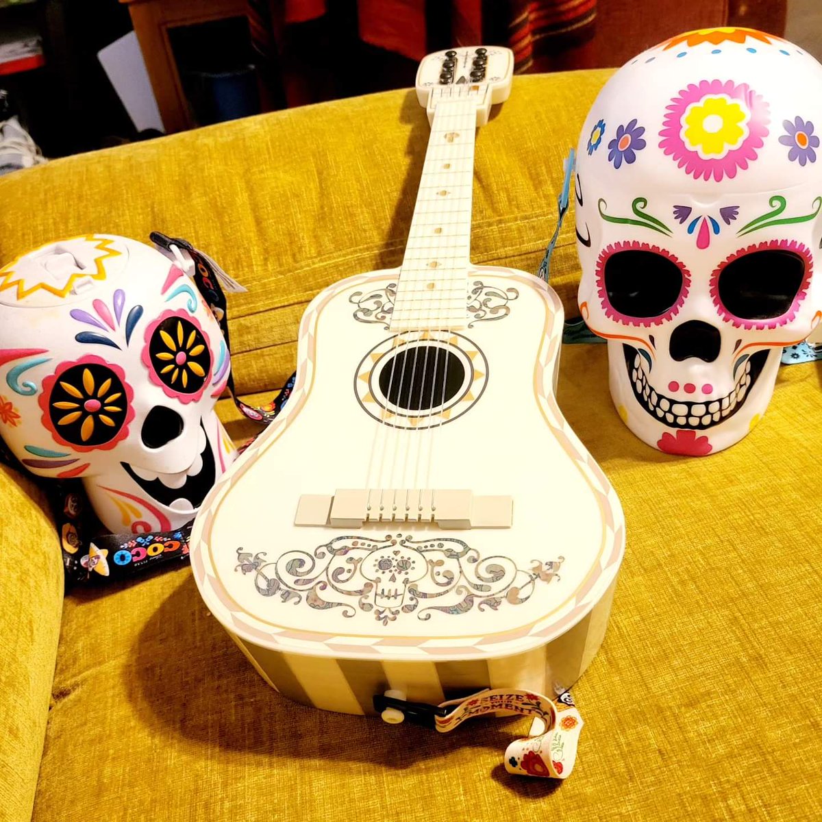 My Coco guitar popcorn bucket is making friends with the Skull