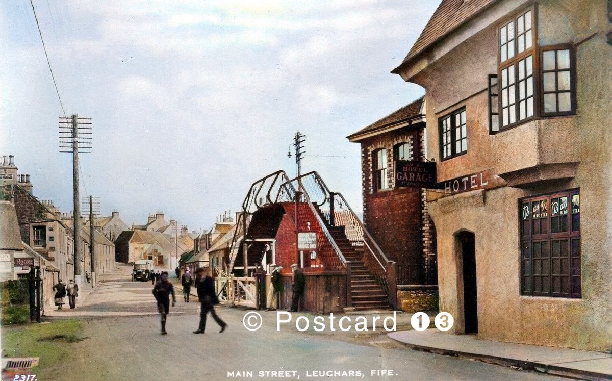Leuchars
Leuchars Old Station and the railway line to Tayport, pedestrian bridge on Main Street, Ye Olde Hotel on the right, a service bus coming through the village

#Fife
#Leuchars
#OldPostcard
#LostRailways