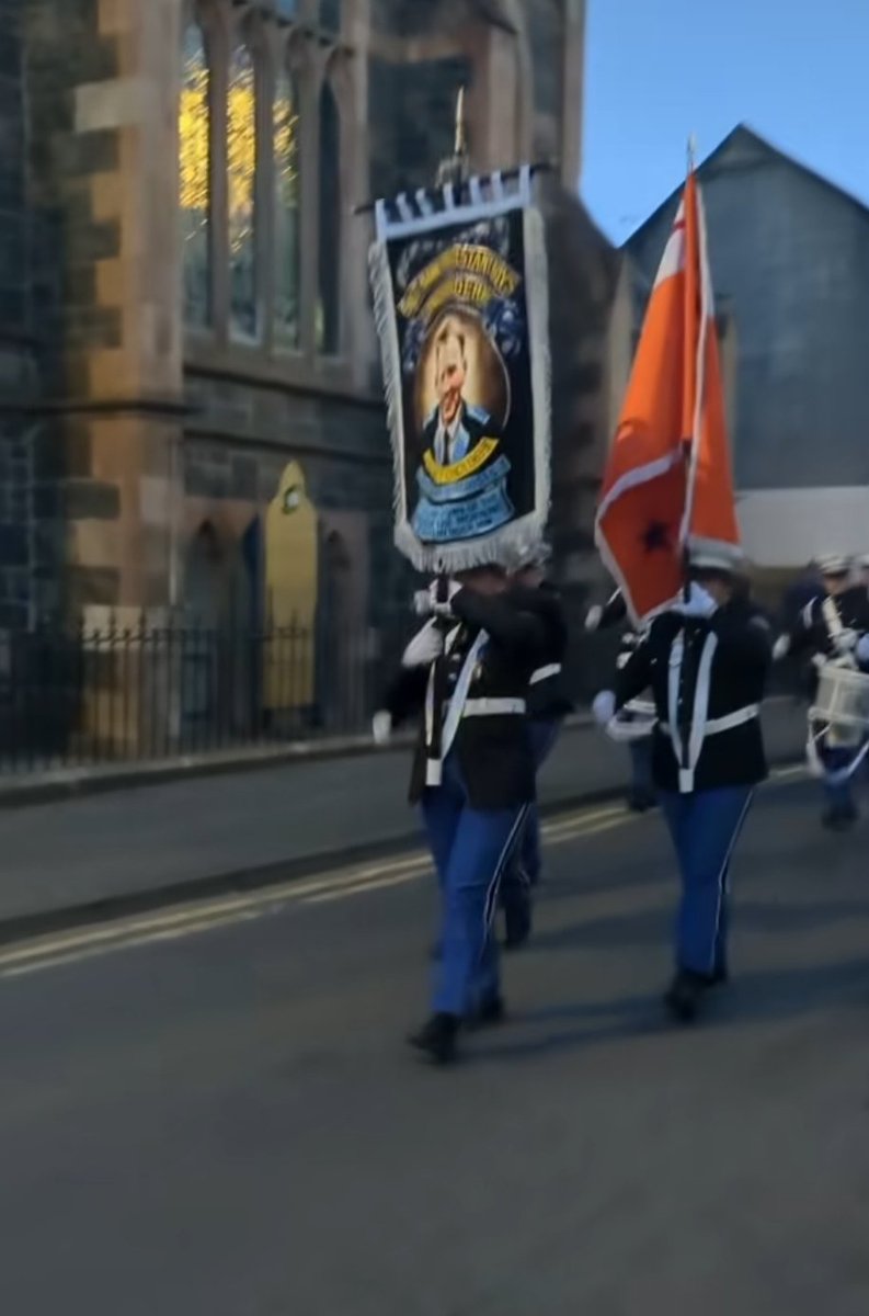 Skewed against the UK community she says. Here's a terrorist glorfication parade in Coleraine last night. Led by a band named after a terrorist, carrying terrorist flags, finished off in @ColeraineFC grounds before making to their bar for sectarian session... Not a word said