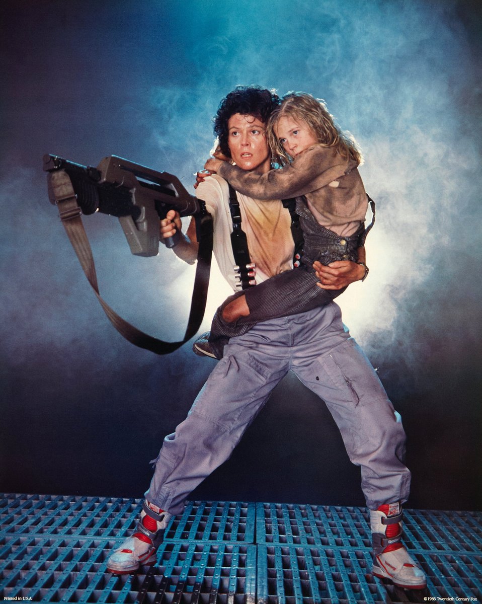 ALIENS publicity still with Sigourney Weaver and Carrie Henn.