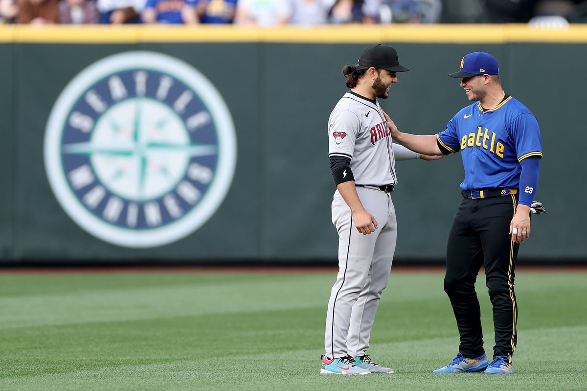 StephChambers76's tweet photo. Eugenio Suárez #28 of the Arizona Diamondbacks receives a warm welcome during his first trip back to Seattle to face his former Mariners team. (Steph Chambers/Getty Images) https://t.co/n8wXgy4l2S
