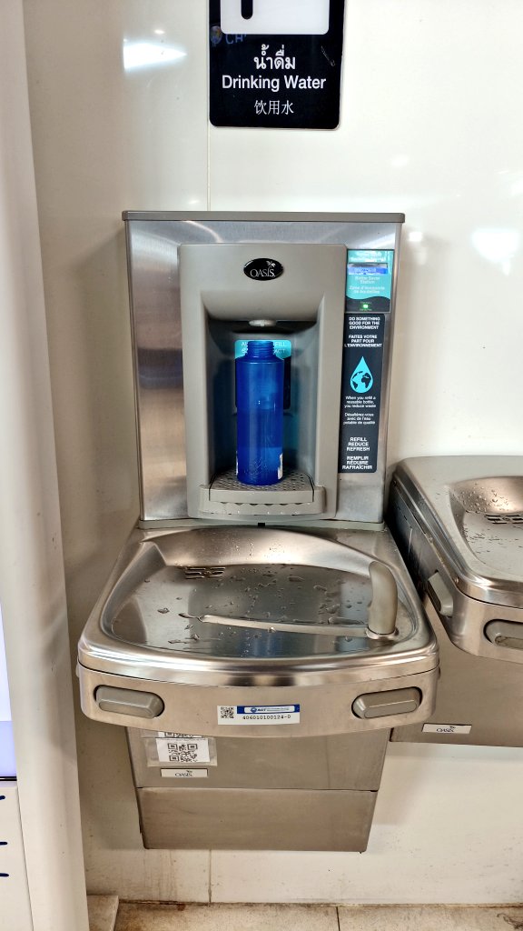 Nice to see water dispensers at Bangkok Airport to refill bottles. Much easier to drink & fill water than using the weird taps below. We should have such dispensers too at our airports.