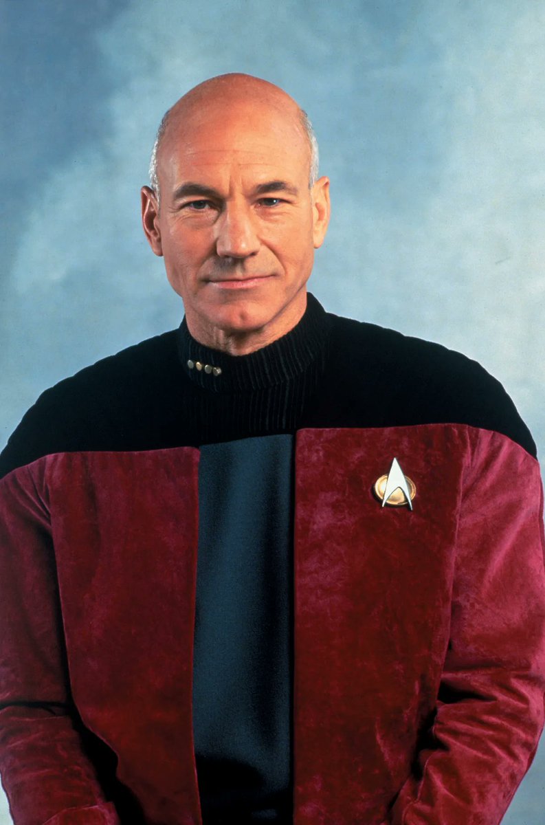 What was with that grey uniform, with the red jacket that Captain Picard suddenly started wearing in Season 5 of Star Trek: The Next Generation? Shouldn't they have said something about it.