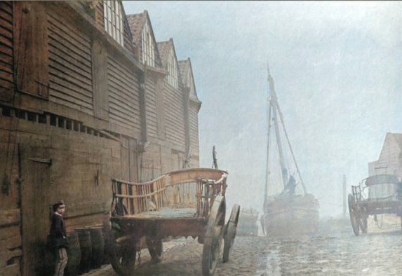 Cannon Wharf, circa 1856. This was a coal wharf off Cannon Row, near Westminster Bridge. The whole area was swept away during the construction of the Victoria Embankment. The type of coal trolley or waggon seen here first appeared in the late 18th century.