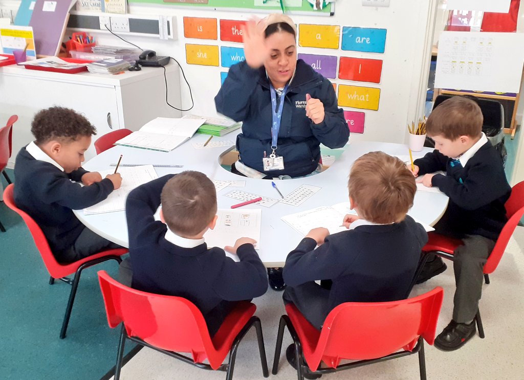 A <a href="/Talk4Writing/">Talk for Writing</a> maestro at work with four enthusiastic Reception writers at the horseshoe table! 
✍🏽📚✅⭐