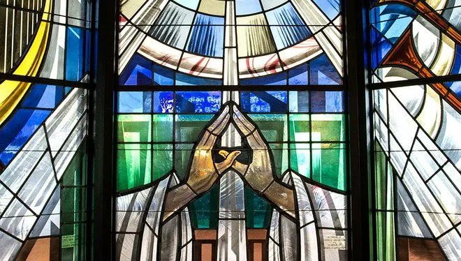 While my wife had gallbladder surgery yesterday, I visited the chapel, a stand-alone building with 16 stained-glass windows & 16 etched door panels. This is what you face. It was simply beautiful and serene, and a calming escape from the waiting room & hospital noise.