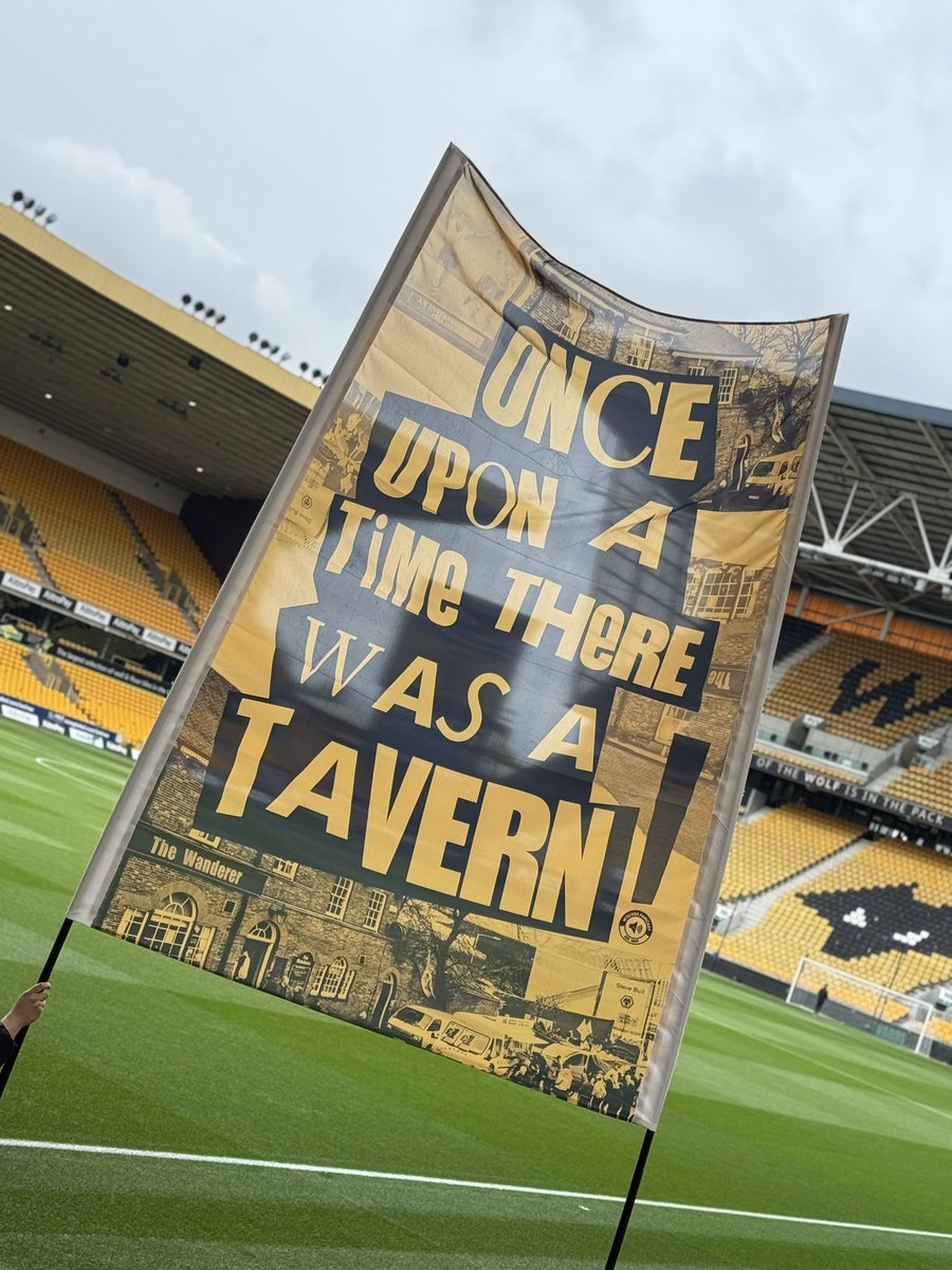Set up at Molineux all done…another new flag will be flying today courtesy of @wolvesfancast - remembering an old staple of Molineux match days - The Wanderer pub!