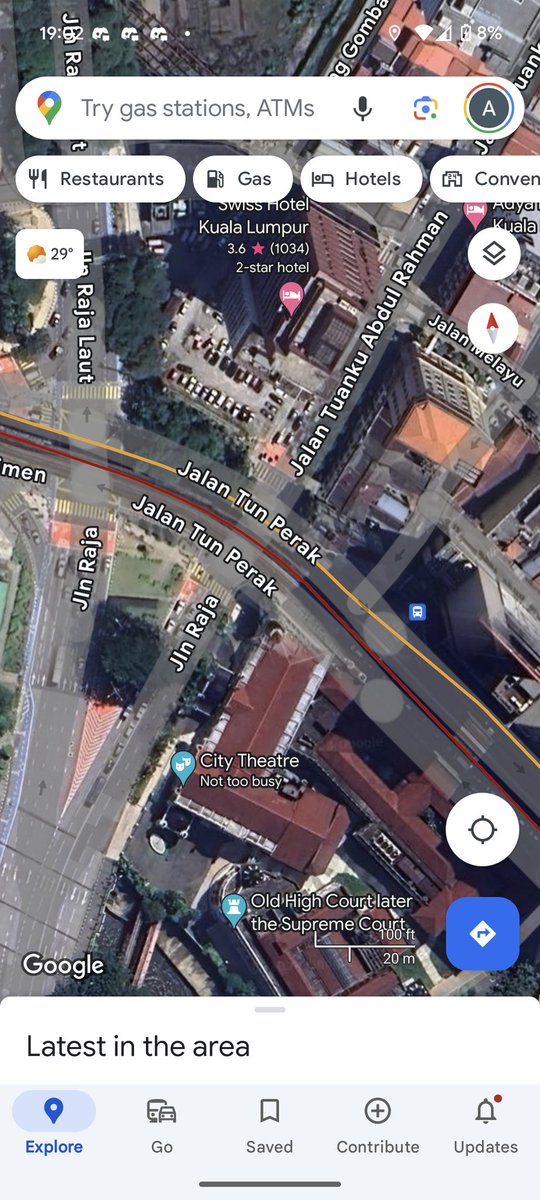 My best guess is that this was at the junction between Jalan Tun Perak, Jalan TAR, and Jalan Raja; northwest of Dataran Merdeka.

The building with the arches is Panggung Bandaraya (National Theatre)