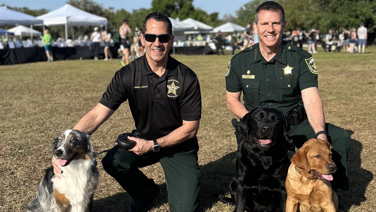 OrangeCoSheriff's tweet photo. This morning, we were at #PawsforPeace at Blue Jacket Park to support @harborhousefl and the important work they do to end domestic violence in our community. 🐾🦮 https://t.co/DwDZ9na5FR