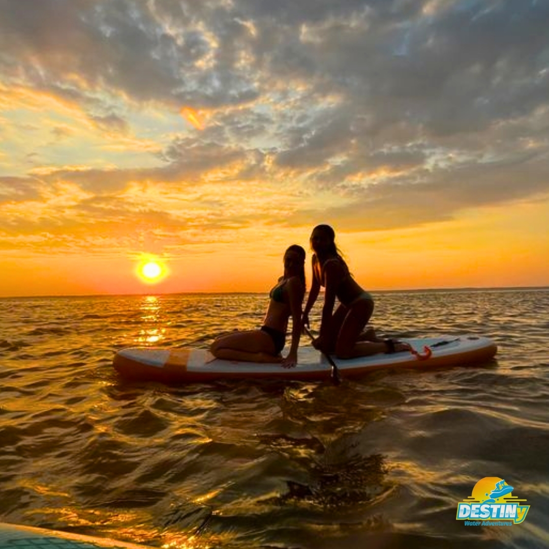 Unwind and soak in the breathtaking sunset views from your paddleboard. 🌇🌊

 #Sunsetcruise #PaddleboardExperience #crabisland #destinywateradventures #jetskirentals #boatrentals #destin #fortwaltonbeach #okaloosaisland #springbreak