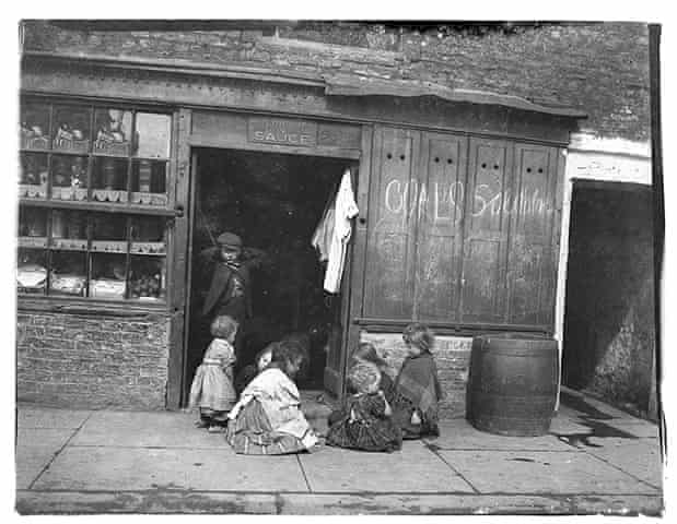 Coals for sale, children play outside a shop front in the centre of Newcastle c1850-1860.

_____ 
#newcastle #newcastleupontyne #newcastlehistory