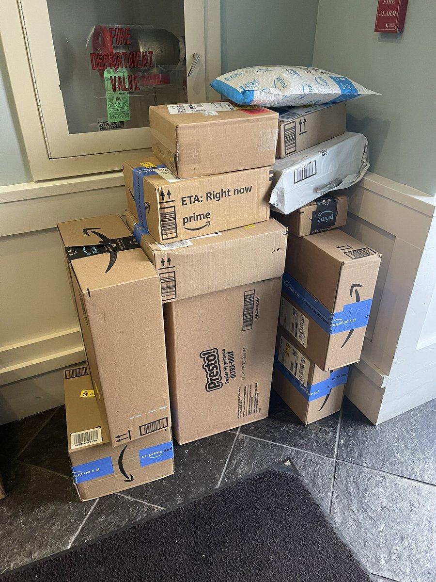 bobgreenlees's tweet photo. @amazon this entire stack of packages was mis-delivered to our address. How can we get Amazon to come pick these up? https://t.co/FiiIOdkeQJ