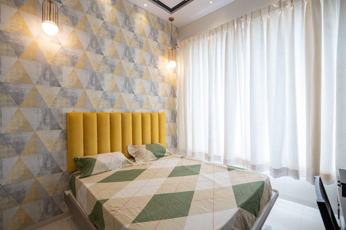 Sunny vibes in the bedroom ☀️ Yellow headboard, white curtains, and a touch of wallpaper.  #HomeInteriors #headboarddesign #wallpaperdecor #wallpaperdesign #windowblinds 
(Bedroom Interiors, headboard designs, wallpapers for bedroom, wallpaper decor, bedroom design ideas)