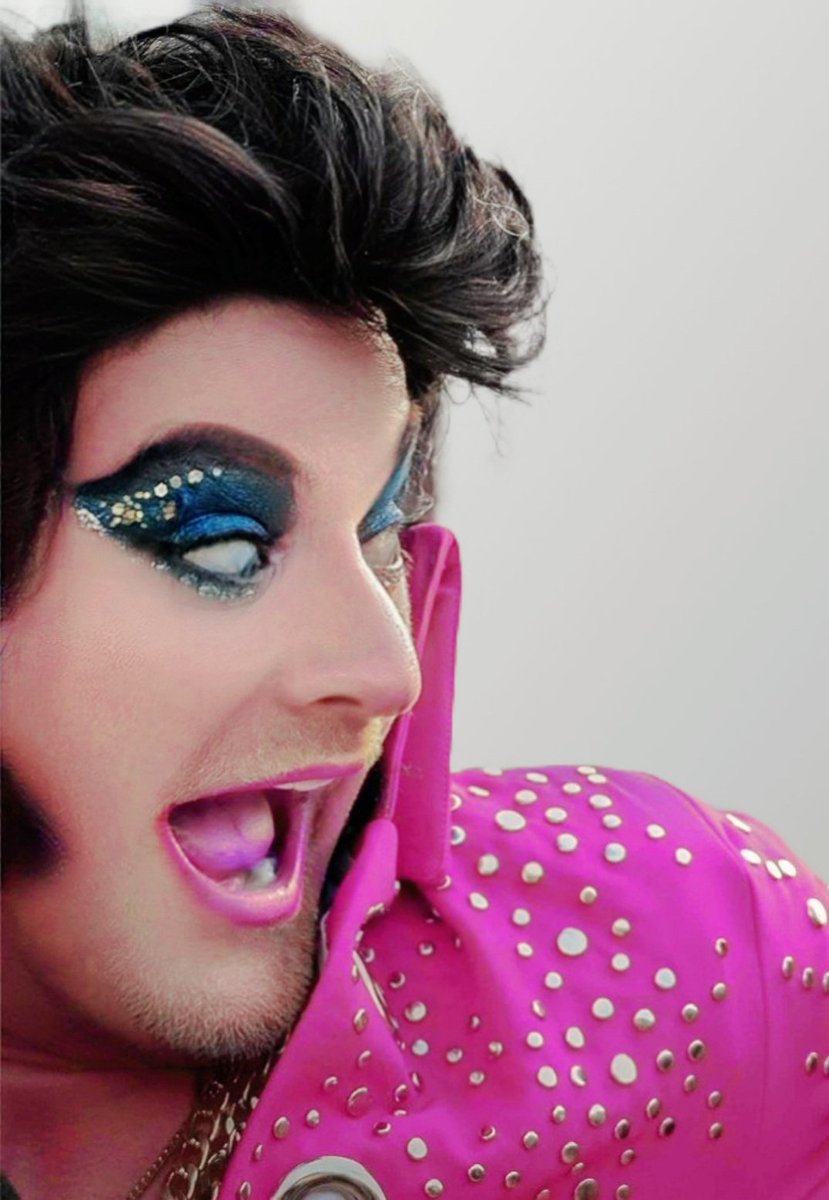 "🎸💖 Watch out, world! Elberace  - Gay Elvis is heating up in pink! 🔥 Who knew the King/Queen of Rock 'n' Roll could look even hotter? 💃 #HotInPink #ElvisVibes #lgbtq🌈 #gaynews #entertainment #iconic #jumpsuit #retro #hunkofburninglove #lgbtqmedia