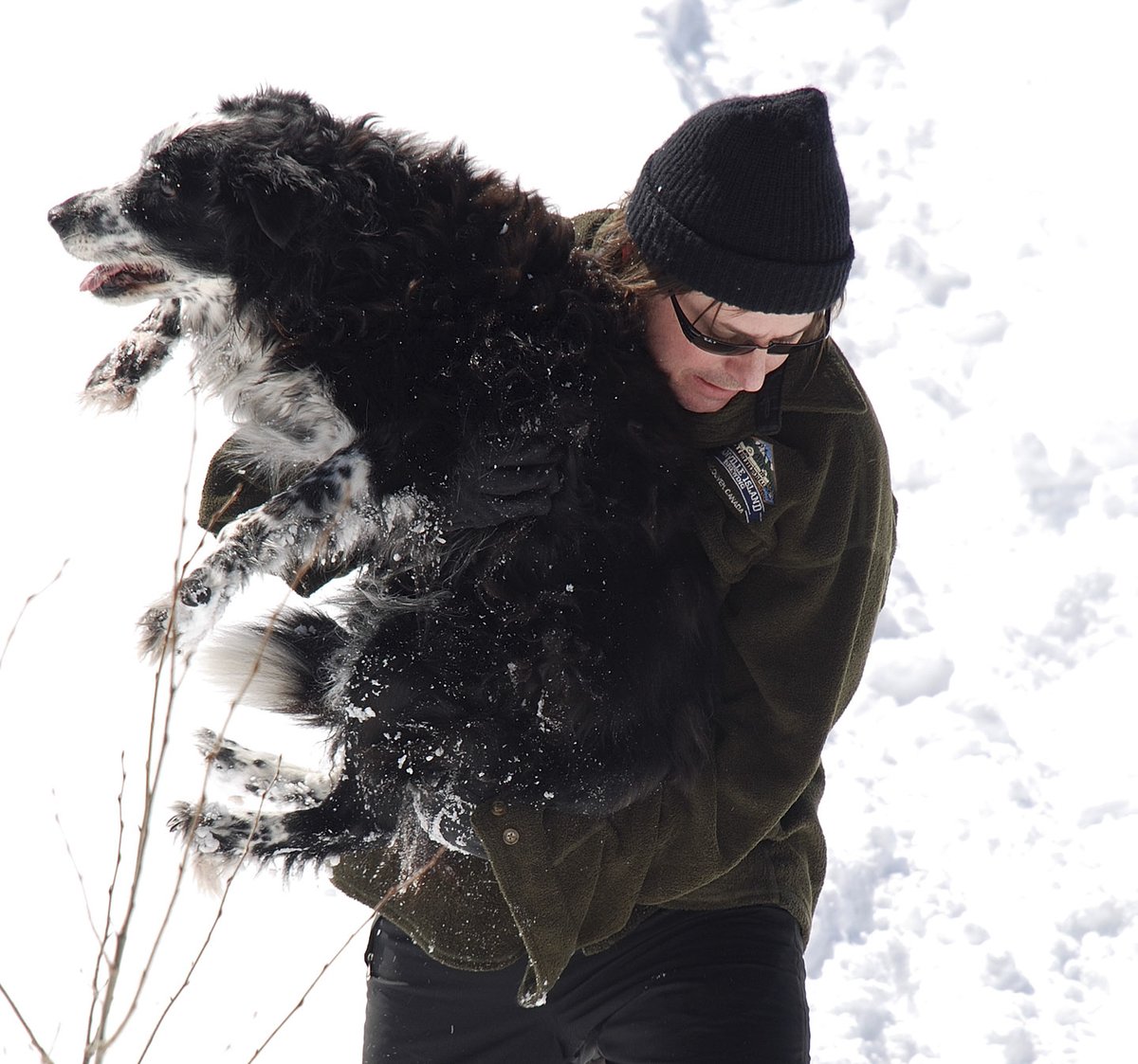 My husband carrying our 14 year old dog Molly up a hill so she could enjoy a hike with us. My 'X' feed is filled with photos of people sharing joy and love with their dogs. @KristiNoem's political career is over. An unconscionable #puppykiller and proud of it. Vile.