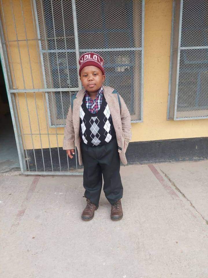 Guys we understand it's cold in the morning, but do you really have to dress your kids like they are going for lobola negotiations?