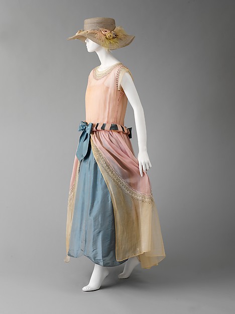 Often overlooked in favor of the dominating “la garçonne” or flapper look of the 1920s, this Robe de Style by Jeanne Lanvin shows another one of the most popular styles of women’s dress during the decade. Read more! fashionhistory.fitnyc.edu/1920-1929/